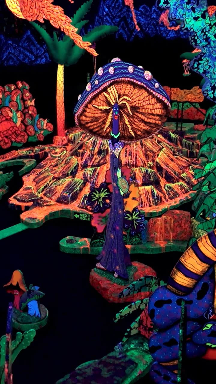 The blacklight course of a Putting Edge venue, in the neon set of its campaign film