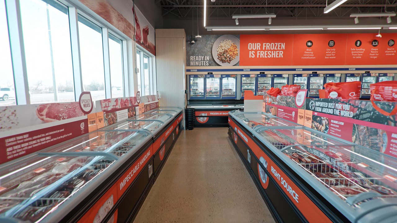 The frozen aisle of a Wild Fork store, filmed under the chain&rsquo;s own signage