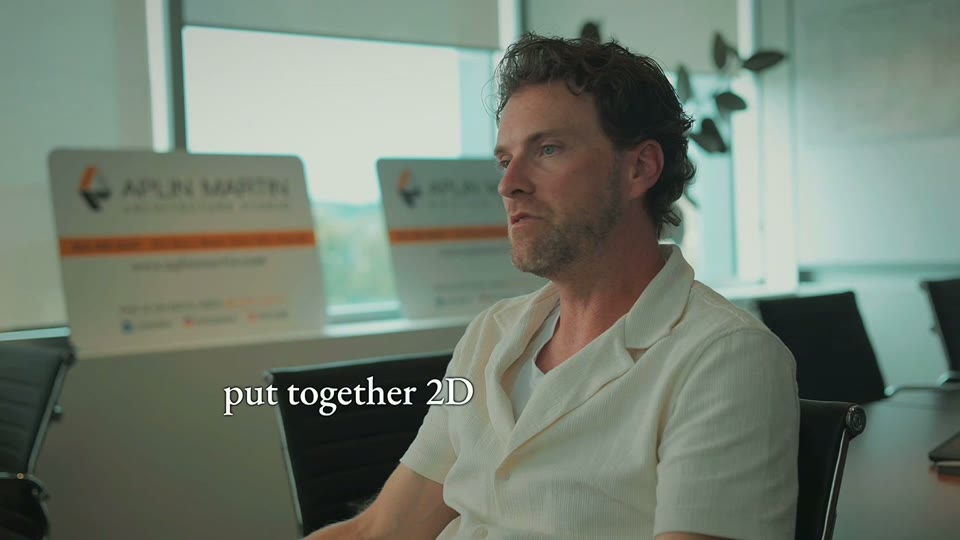 A customer speaking to camera in an Aplin Martin meeting room, from a film for Platinum Construction