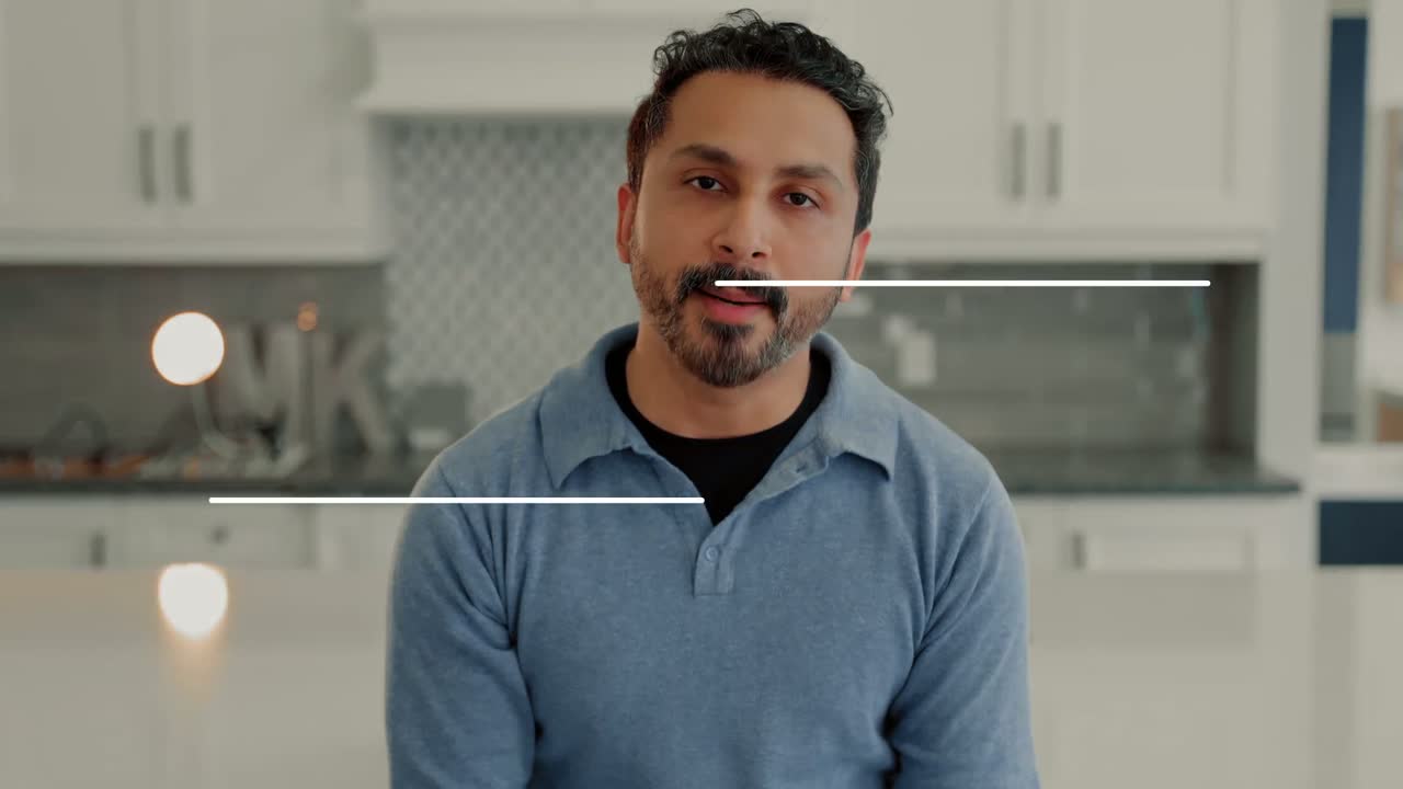 A client speaking to camera in his own kitchen